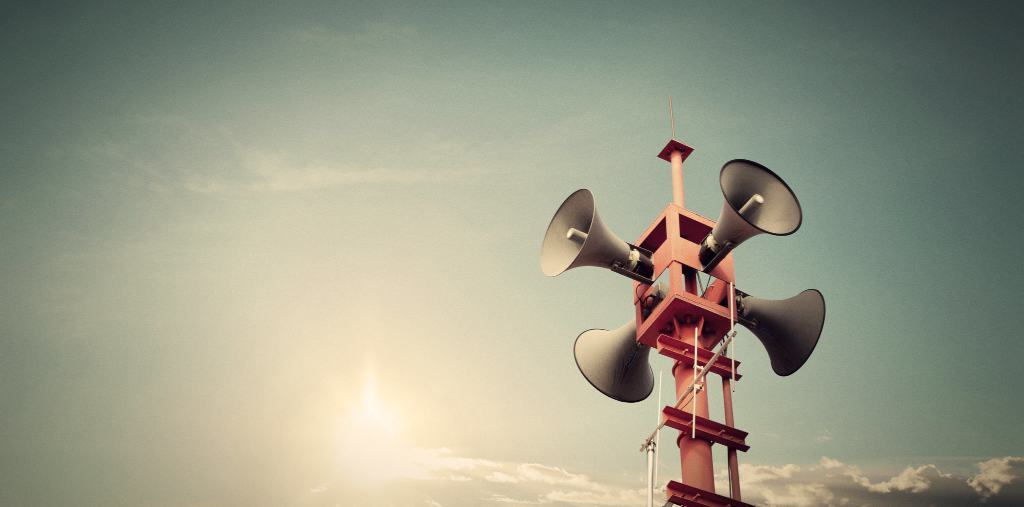 A tower with four speakers